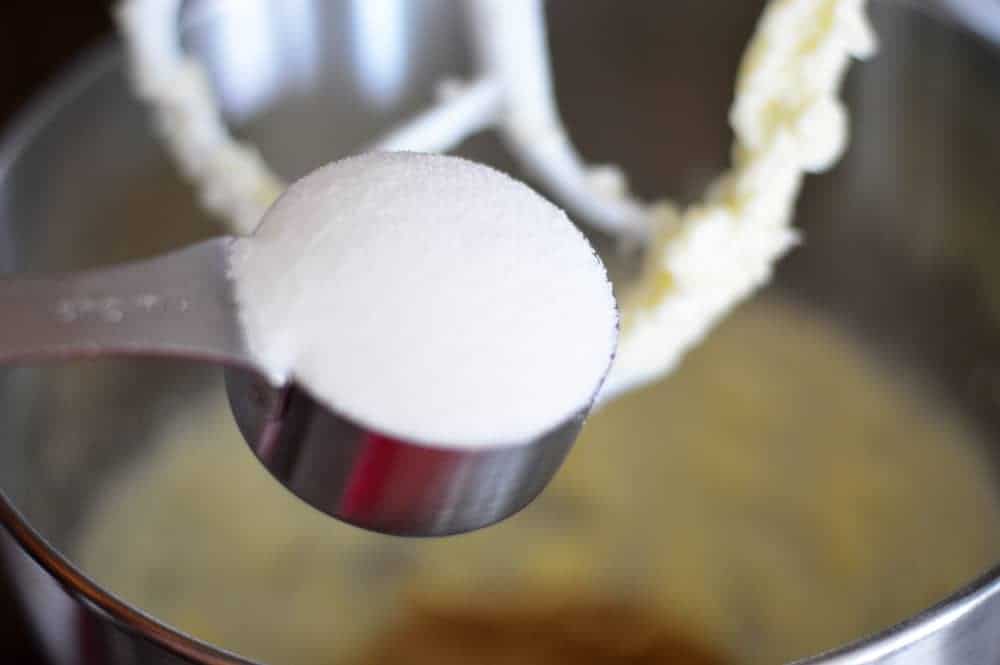 Adding sugar to butter mixture for Big & Chewy Vegan Oatmeal Raisin Cookies