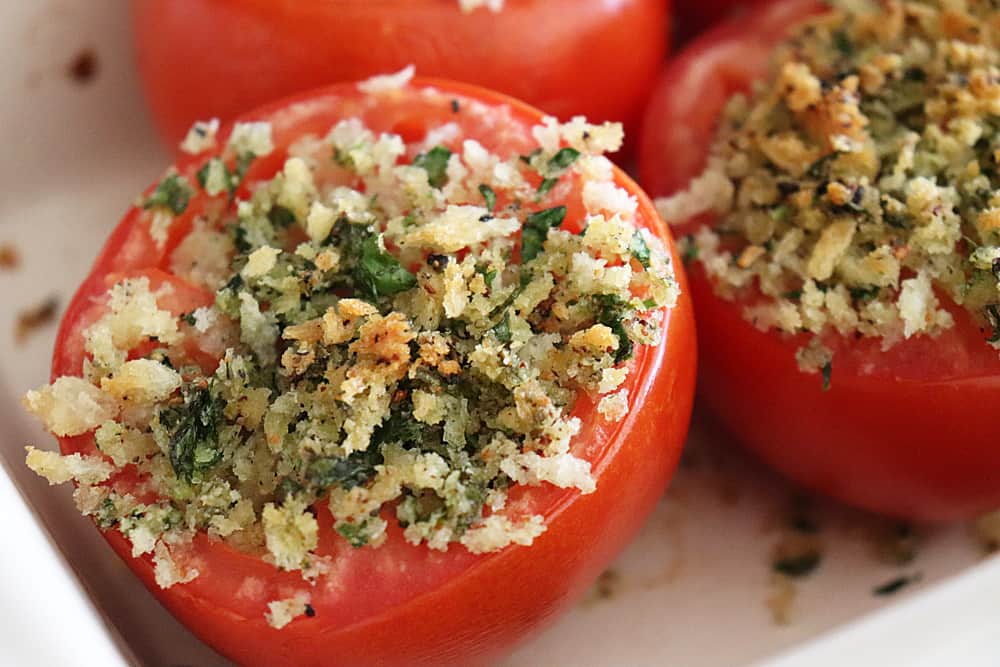 Close up of baked stuffed tomatoes