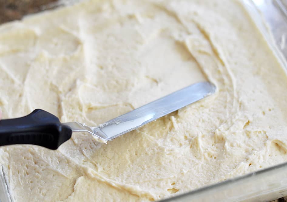 Spreading batter into a glass baking dish