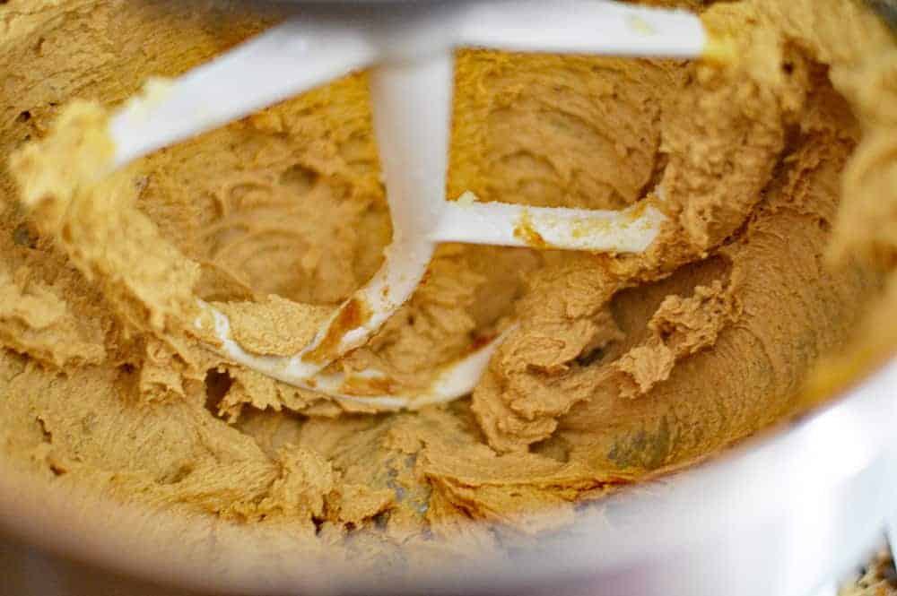 Batter in mixing bowl for Big & Chewy Vegan Oatmeal Raisin Cookies