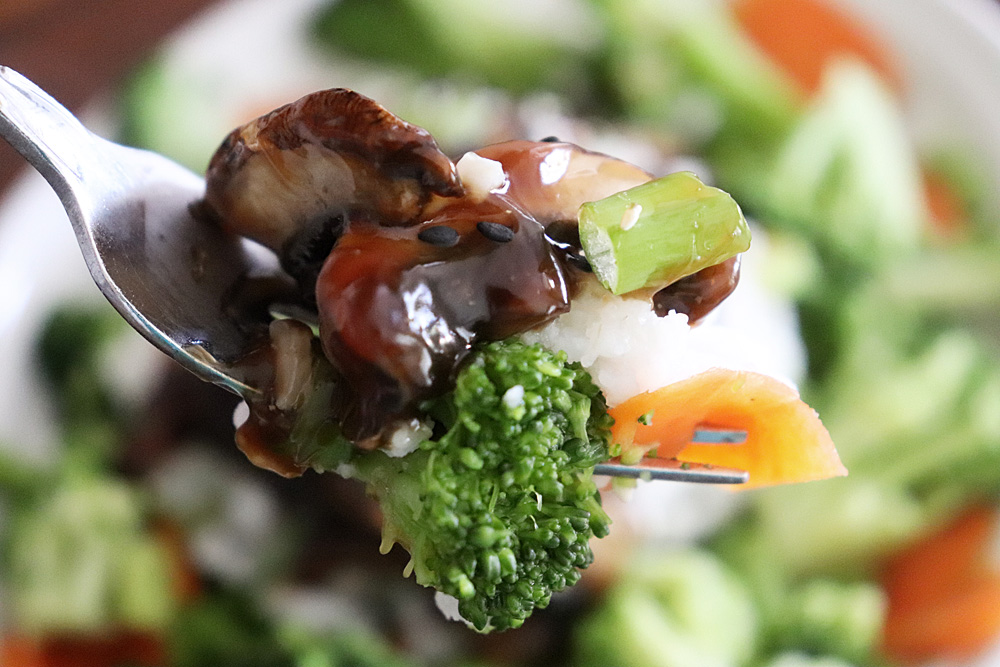 Bite shot of Easy Vegan Teriyaki Mushrooms