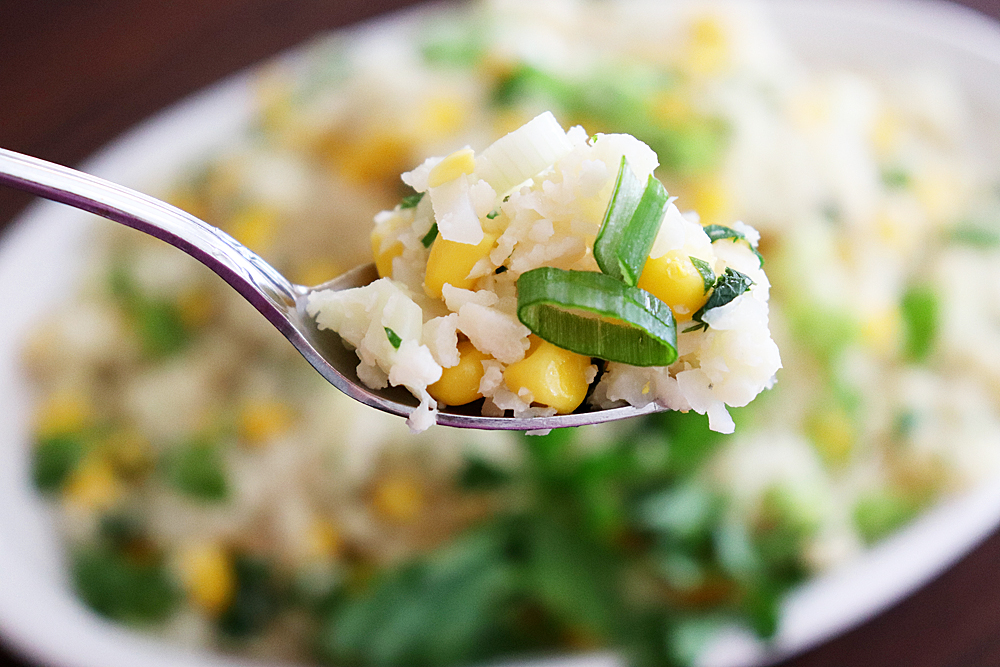 Bite shot of Vegan Corn Fried Cauliflower Rice