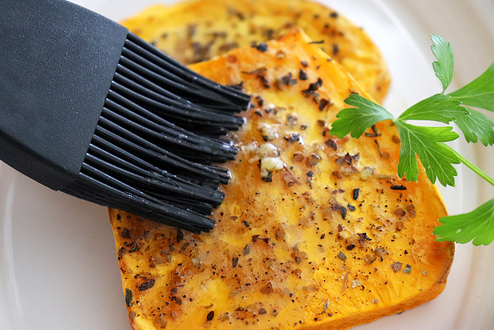 Brushing with vegan garlic butter