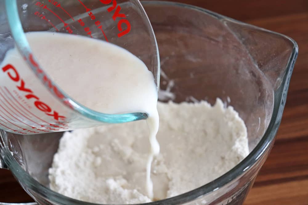 Adding the buttermilk mixture to the flour mixture