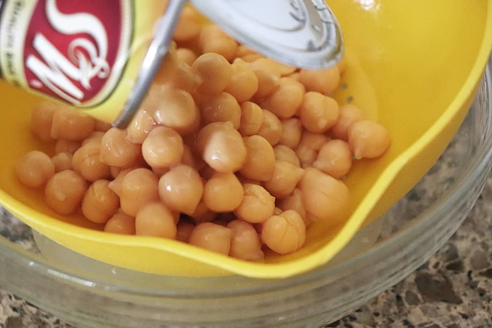 Drain chickpeas and reserve liquid