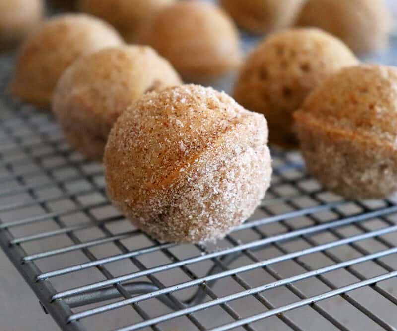 Baked Baked Apple Cider Doughnut Holes on rack