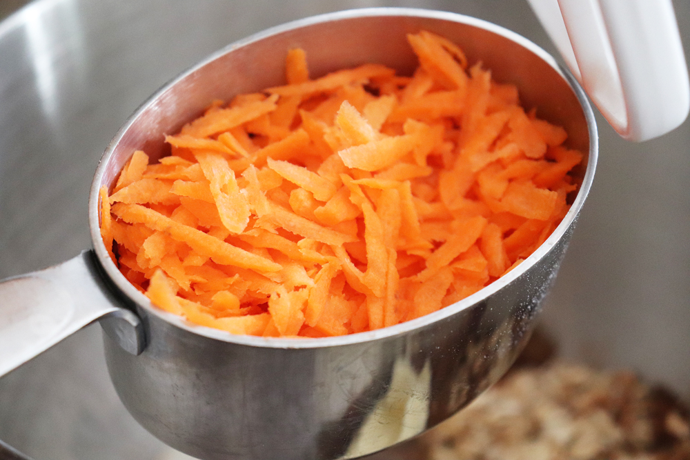 Adding grated carrots