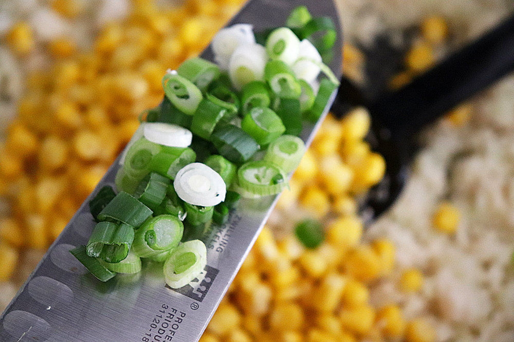 Adding green onions