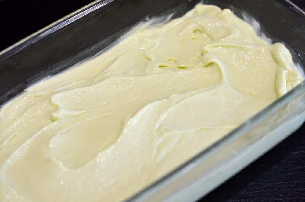 Glass loaf pan full of Vegan Avocado Ice Cream Recipe