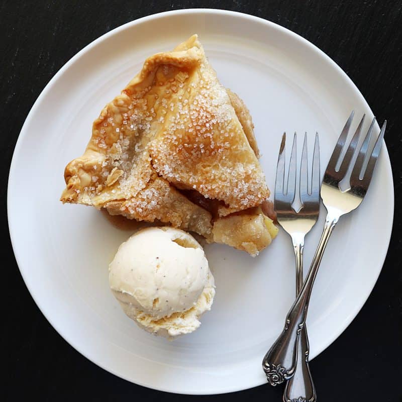 Overhead view of slice of apple pie