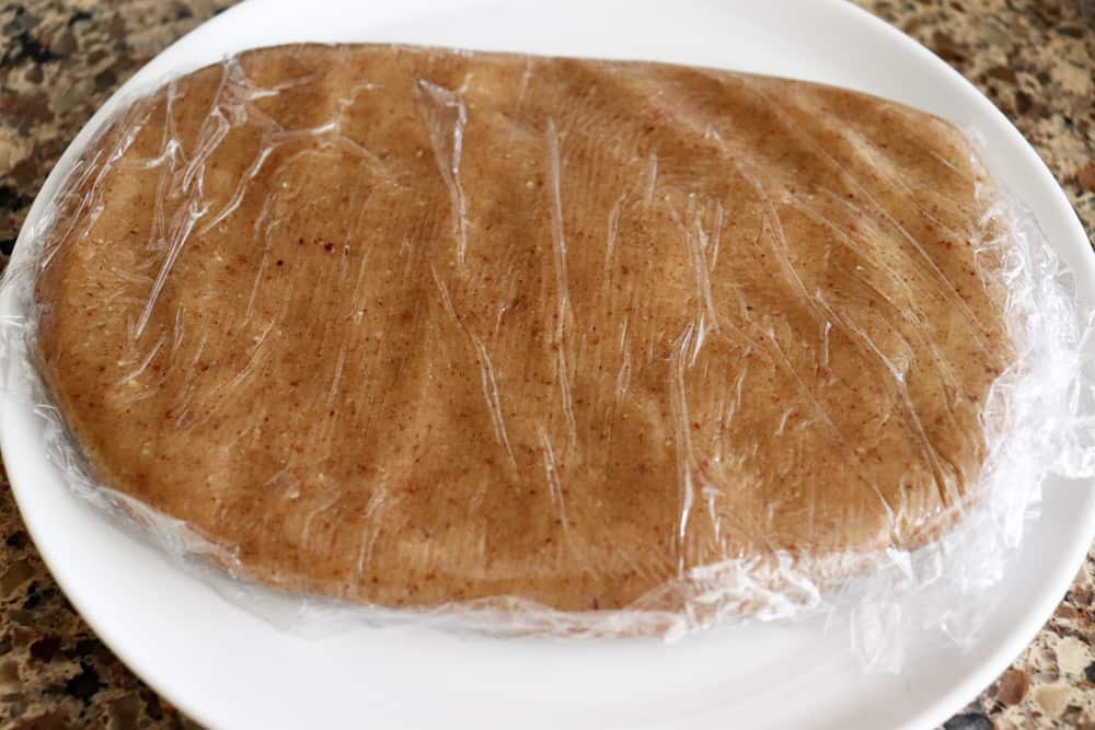 Wrapping dough in plastic wrap