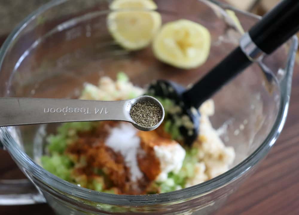 Adding pepper to the mixture