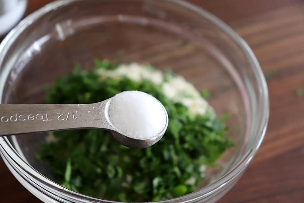 Measuring spoon full of salt