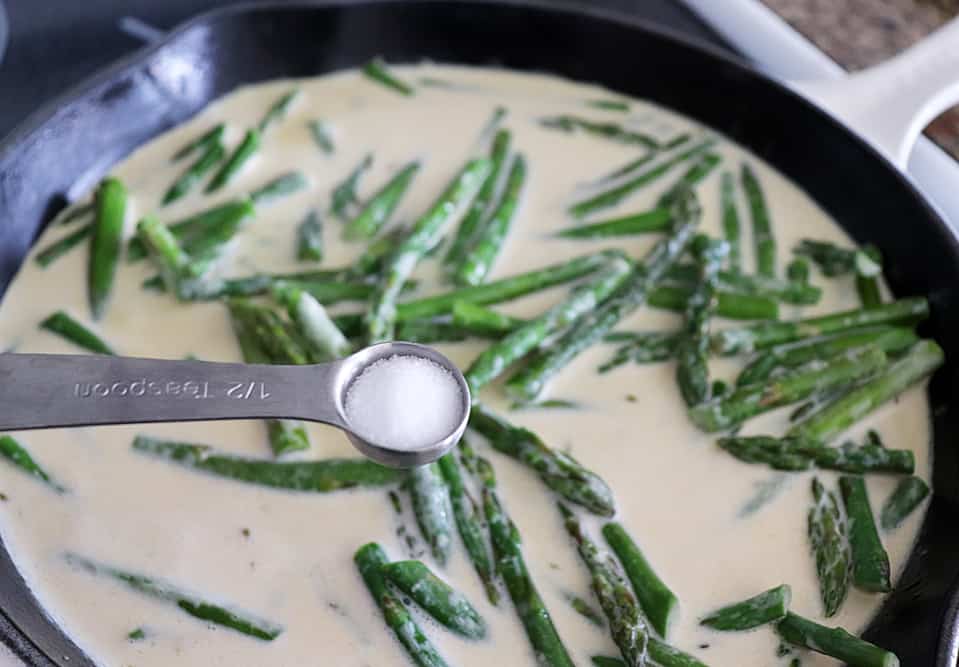 Adding salt to asparagus