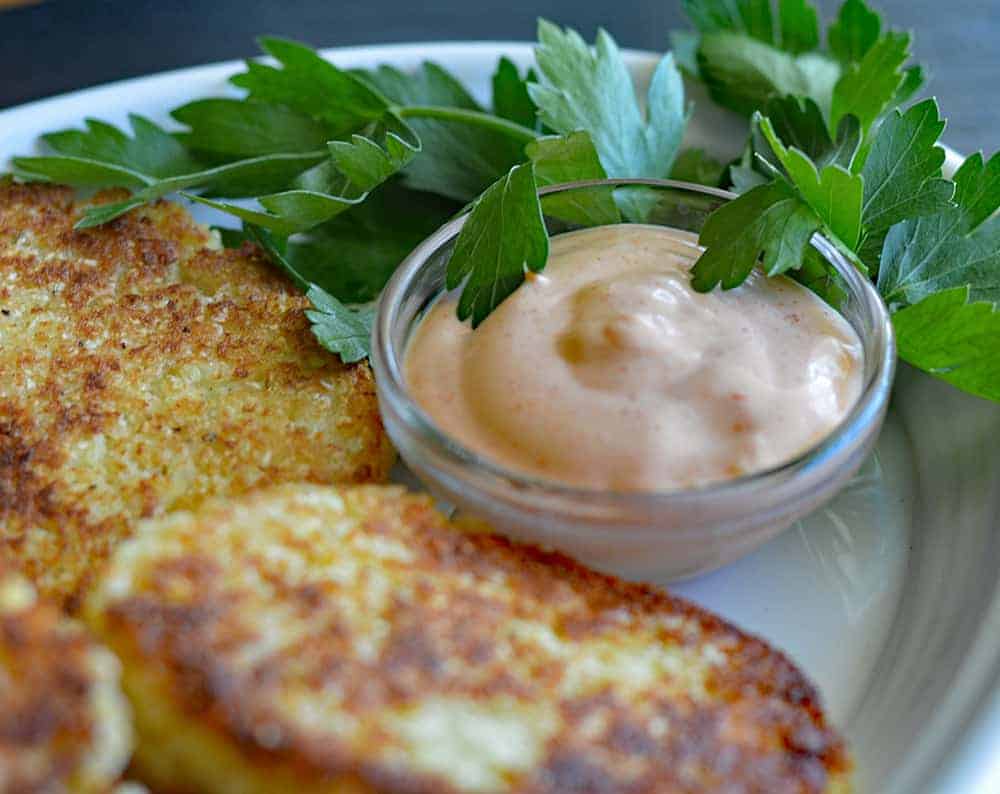 Plated of fritters featuring Copycat Outback Bloomin' Onion Sauce