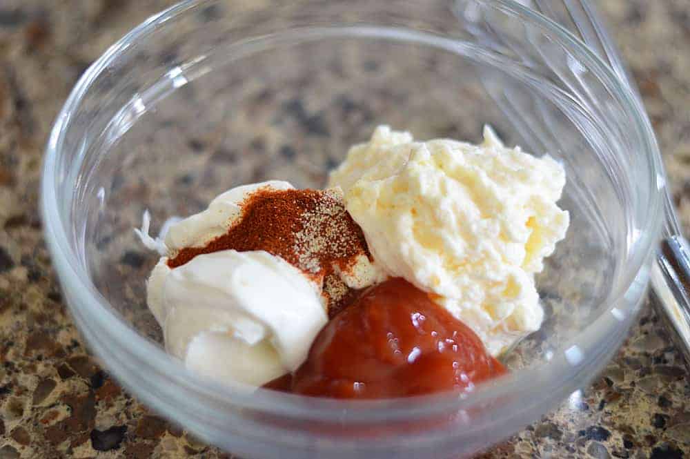 Ingredients for Bloomin' Onion Sauce in a glass bowl