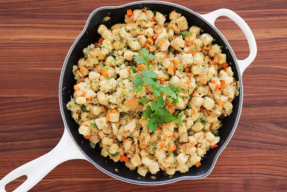 Overhead shot of Homemade Stove Top Stuffing in a white skillet
