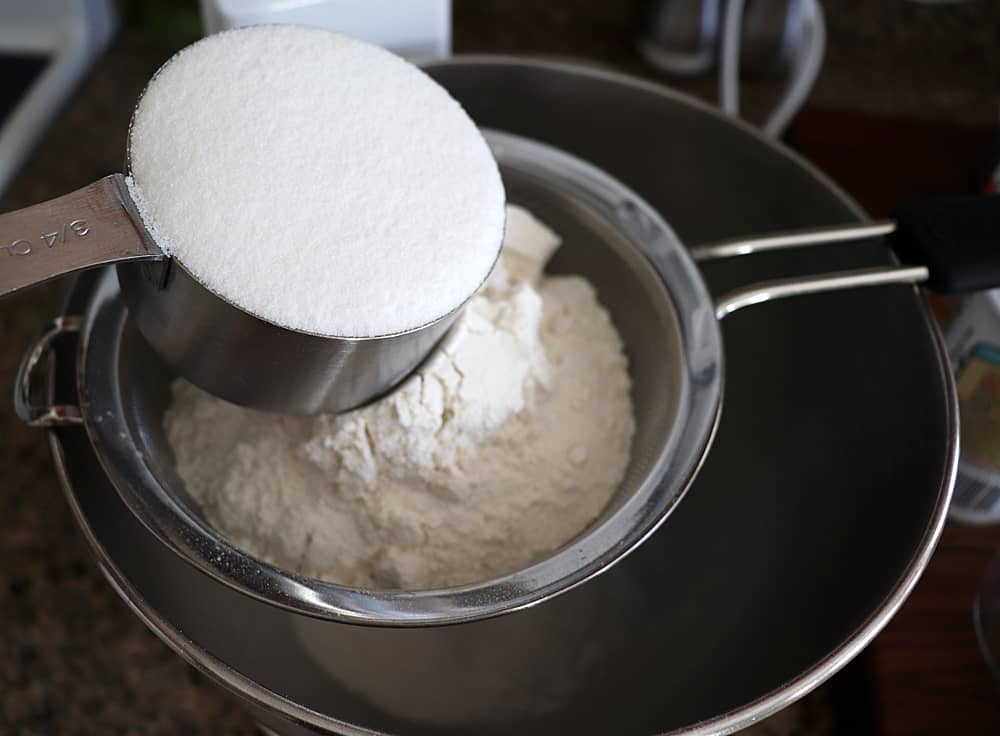 Adding sugar to a strainer 