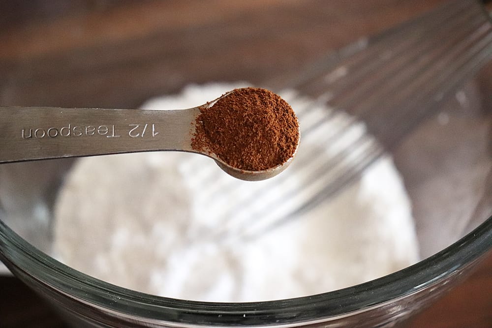 Adding cinnamon to the flour mixture