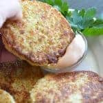 Dipping cauliflower fritter in to Copycat Outback Bloomin' Onion Sauce